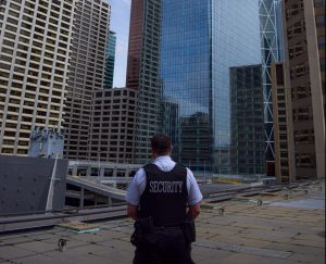 Security guard near office buildings